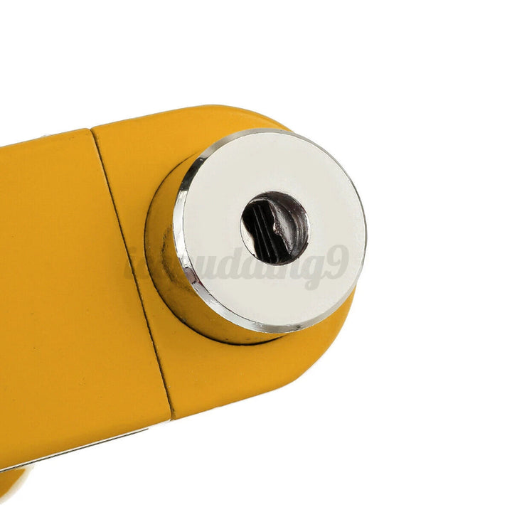 Close-up of Lock Cylinder on Yellow Disc Brake Alarm Lock.
