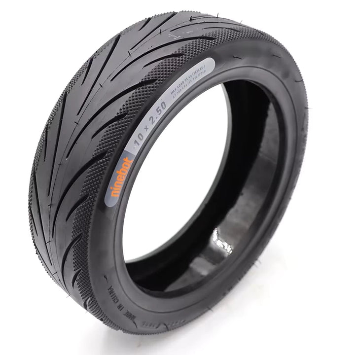 Hero image of Genuine Ninebot 10x2.5 Tubeless Self-Healing Tyre showing angled tread and sidewall branding.