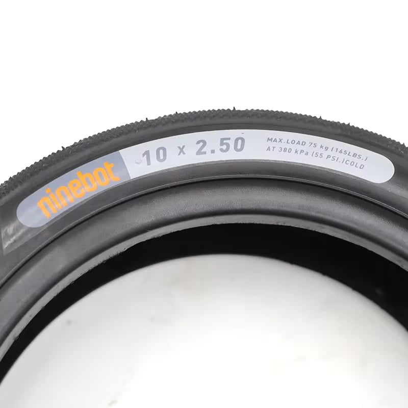 Close-up of the Ninebot 10x2.5 sidewall label displaying tyre size and PSI rating.