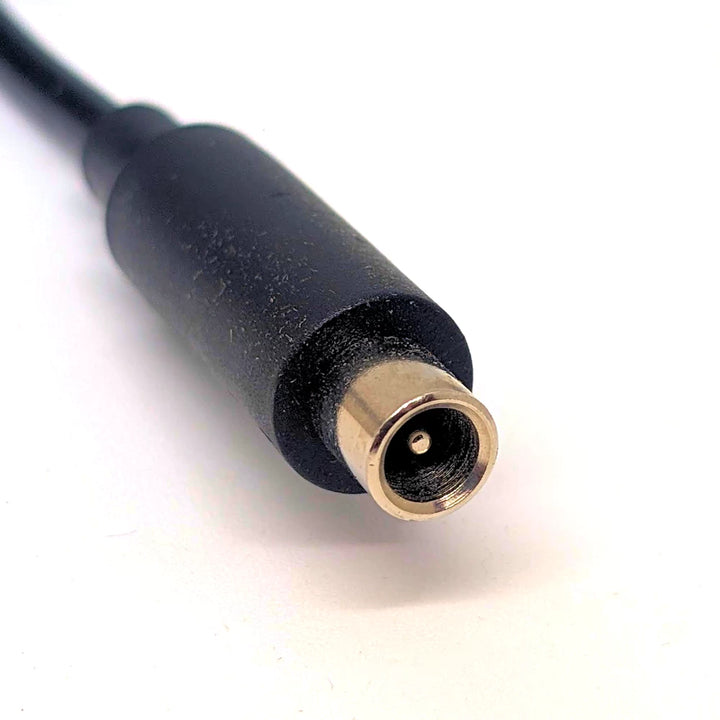 Close-up of round DC output connector for Xiaomi / Ninebot electric scooters.