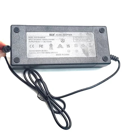 Back view of Charger (63V 1.8A)/AC Power Adapter for Inmotion/Dualtron, displaying specifications and safety certifications - emphasises product authenticity and quality standards.