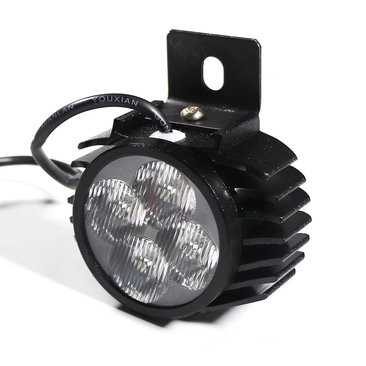 Angled view of Kugoo G2 Pro electric scooter headlight with rugged aluminium heatsink design