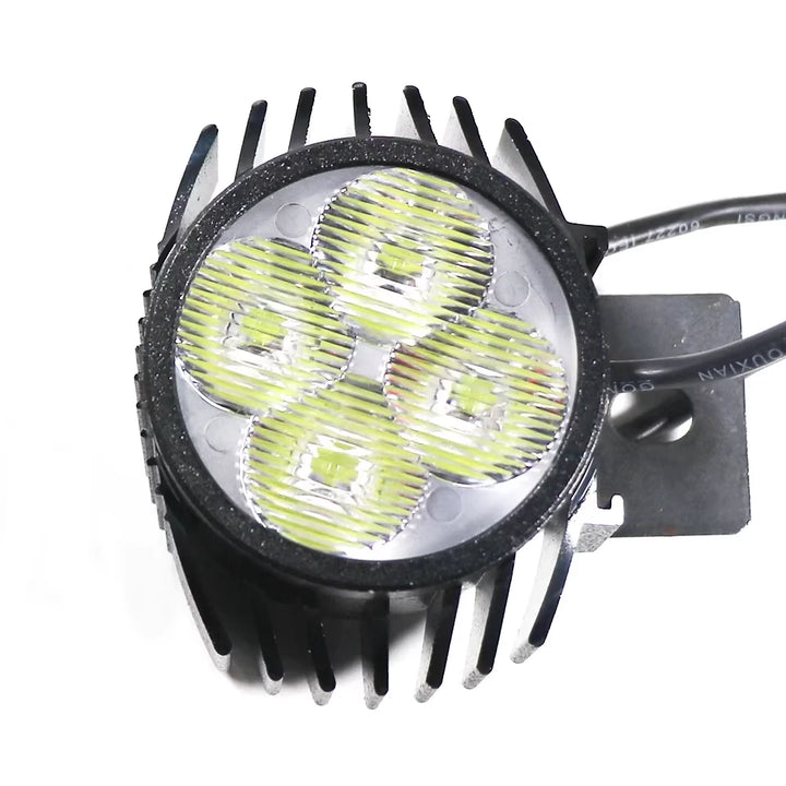 Front view of LED headlight with exposed fins and mounting tab for Kugoo G2 Pro scooter