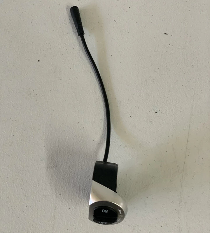 Top view of the replacement part for the EMOVE Touring Electric Scooter's light and horn switch module with durable design.