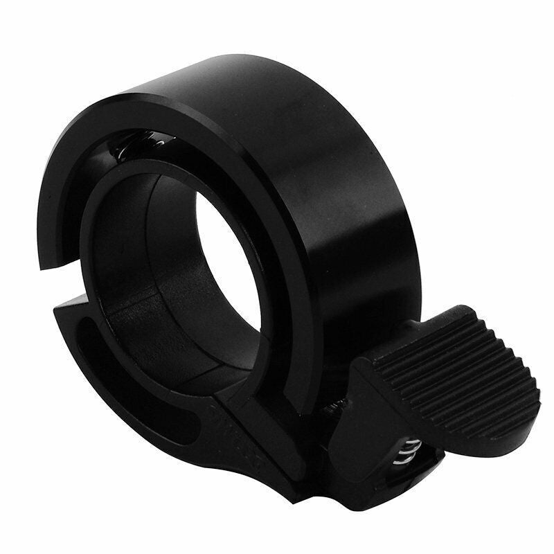 Close-up view of the invisible Q bike bell, showcasing its minimalist design and easy operation.