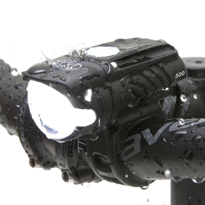 NiteRider Swift 500 bike headlight in use under wet conditions, highlighting waterproof IP64 build quality.