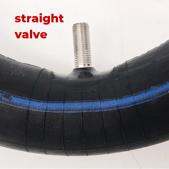 Straight valve stem on inner tube, providing a standard fit for many scooters and e-bikes.