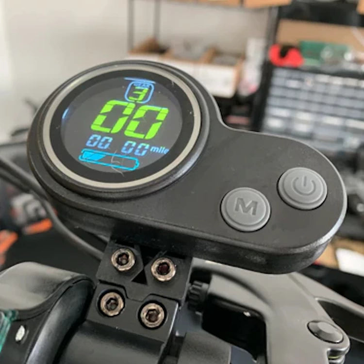 EMOVE Touring electric scooter equipped with a horizontal thumb throttle featuring a bright color LCD display, providing enhanced control and visibility.