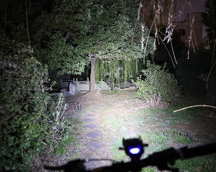 Demonstration of the bike light's powerful illumination in outdoor settings, showcasing the beam intensity.