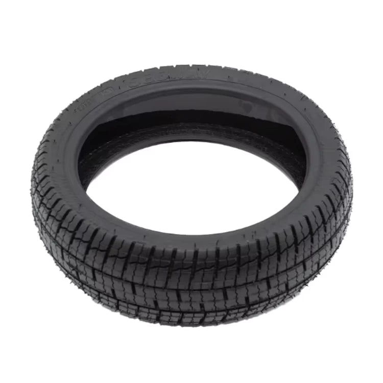 Top view of genuine Ninebot tyre laid flat, showing tubeless construction and self-healing gel layer inside.