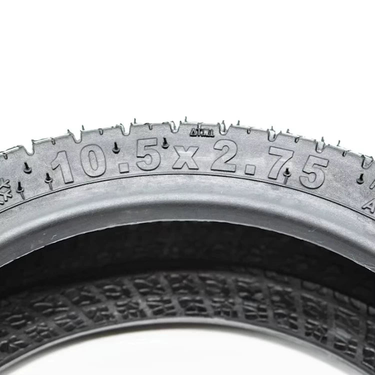 Close-up of sidewall markings showing tyre size “10.5×2.75”