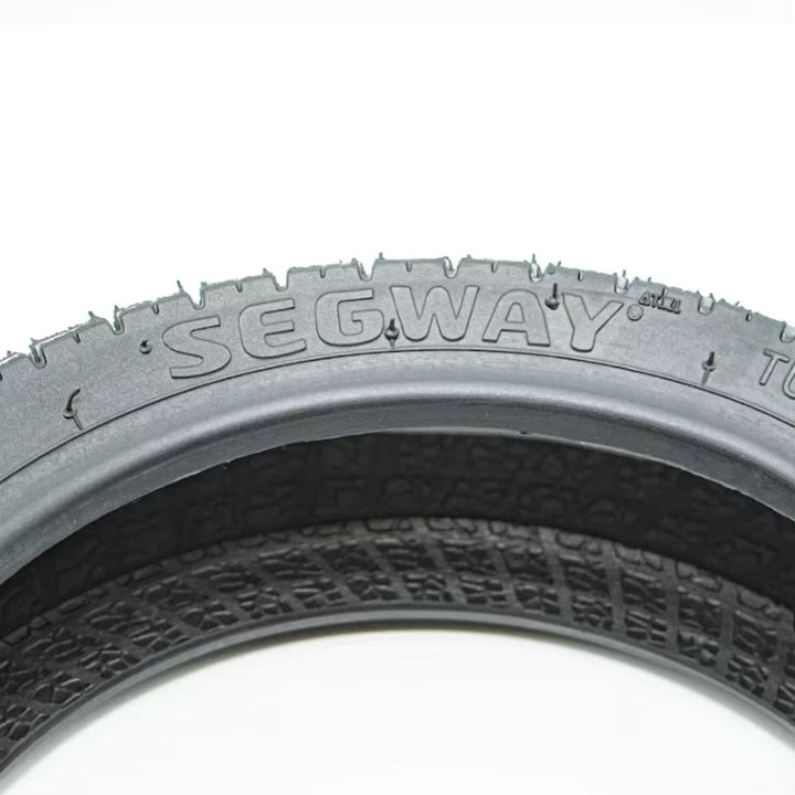 Genuine Segway Ninebot branding embossed on tyre sidewall.