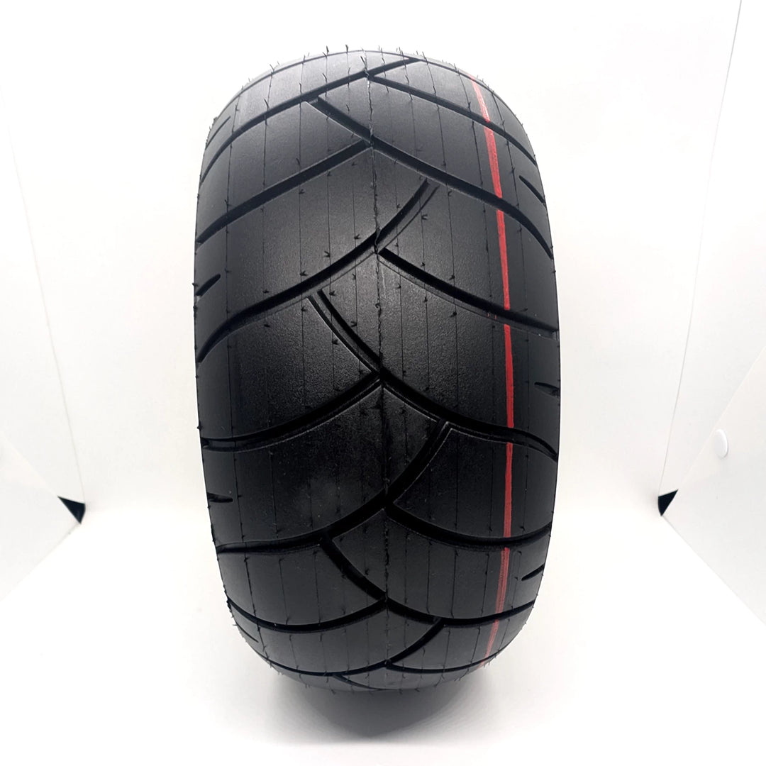 Front-on view of directional tread and red ring tread marking on the Xuancheng 100/55-6.5 self-healing tubeless tyre