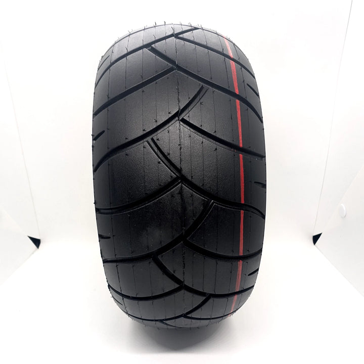 Front-on view of directional tread and red ring tread marking on the Xuancheng 100/55-6.5 self-healing tubeless tyre