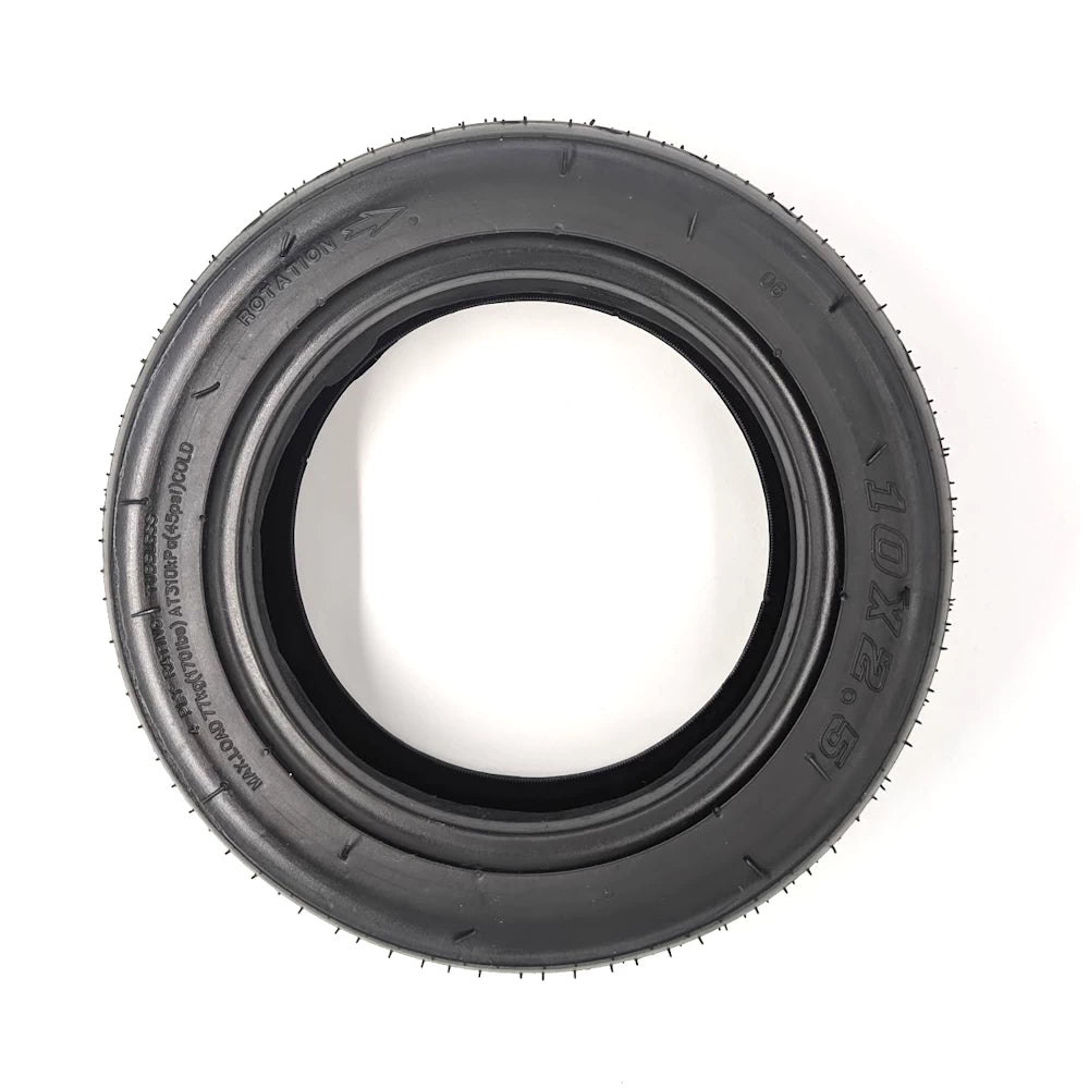 Side profile of 10x2.5 tubeless scooter tyre showing directional arrow for correct orientation