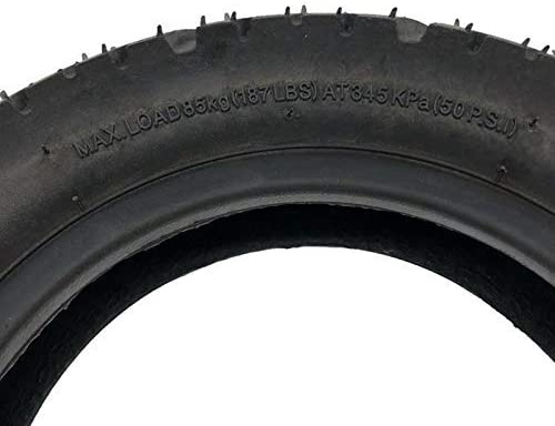 TUOVT 255x80 all-terrain tyre for electric scooters, providing superior traction and durability on diverse surfaces for enhanced off-road performance. A specifications of the tyre are printed on the wall. Max Load 85kg (187 Lbs) at 345kpa (50 psi).