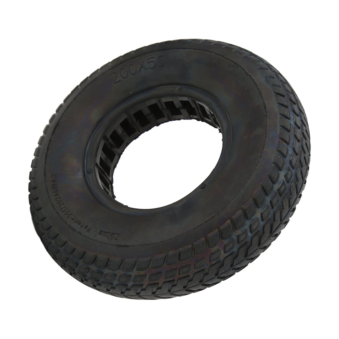 Angled view of black 200x50 airless tyre showing size marking and grooved tread