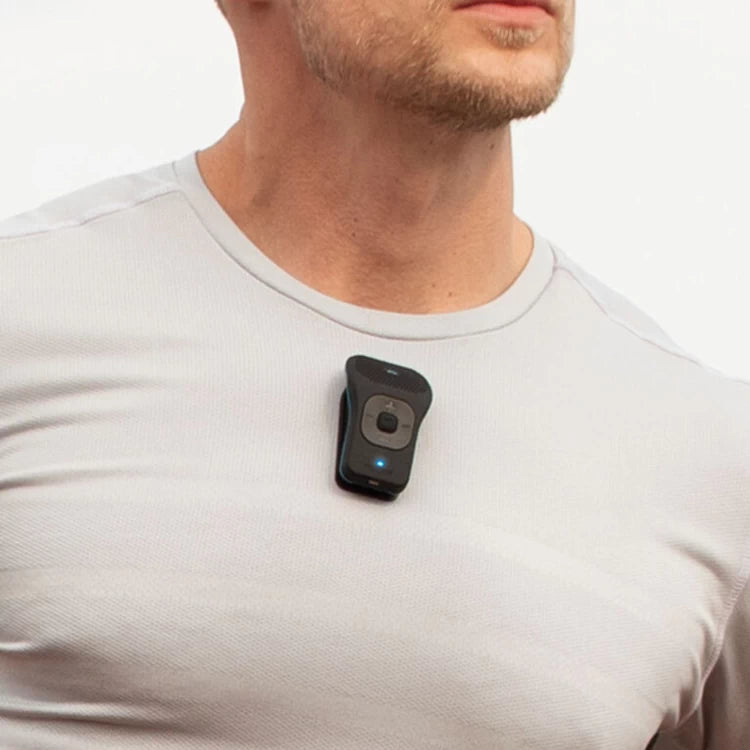 Runner wearing the NoxGear 39g Bluetooth speaker magnetically clipped to a lightweight athletic shirt.