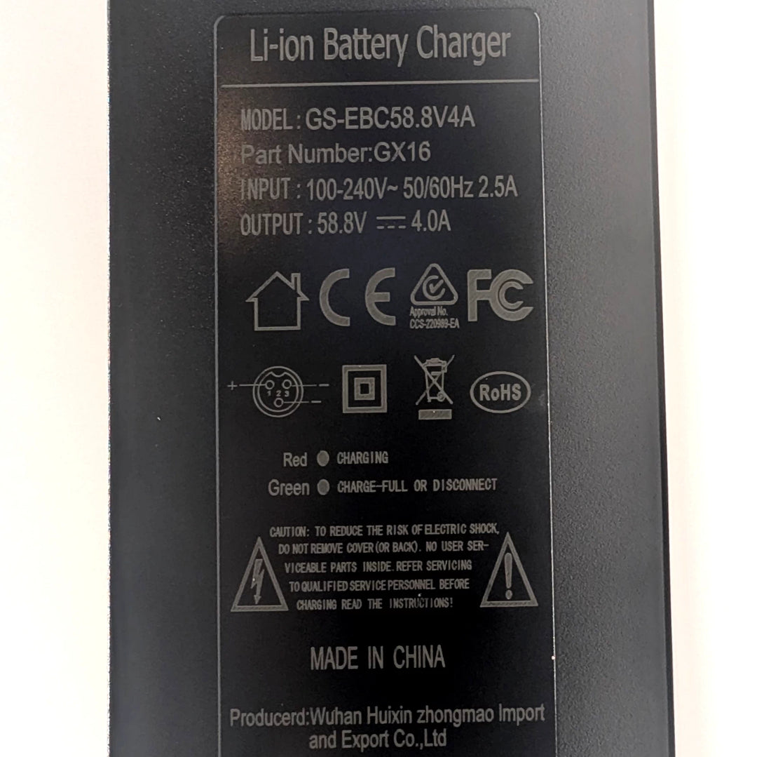 GS-EBC58.8V4A label showing pin 1 positive, pins 2 and 3 negative, and charging indicator information.