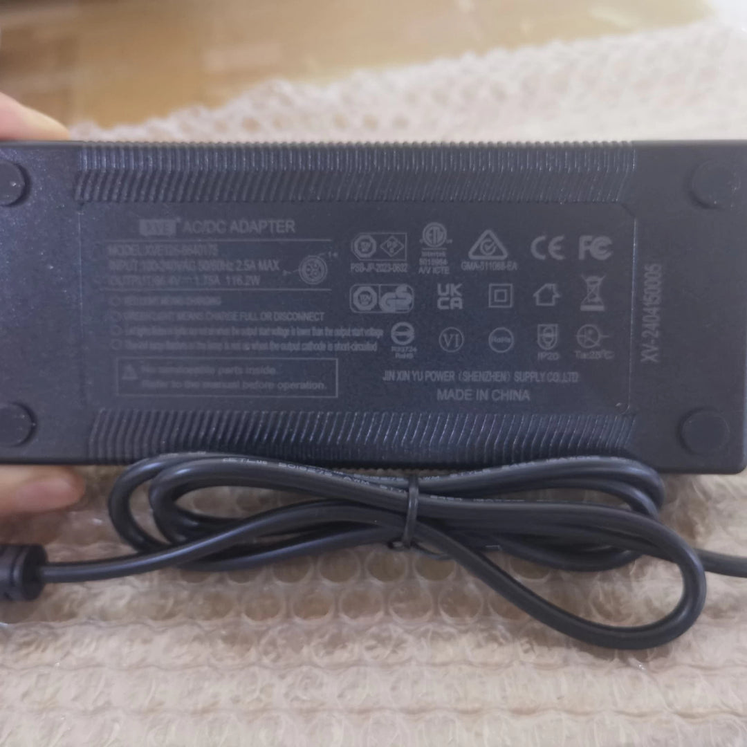 Rear view of 66.4V 1.75A Charger with Baming plug for 60V Dualtron electric scooters, showing compliance certification including RCM, UKCA, CE and FCC.