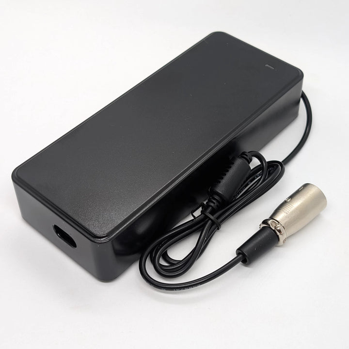 67.2V electric scooter charger showing IEC C8 figure-8 power input