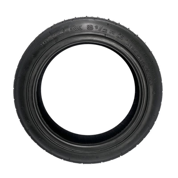 Side profile of 8.5x2 YuanXing scooter tyre showing tyre wall markings, including sizing and directional fitment arrow