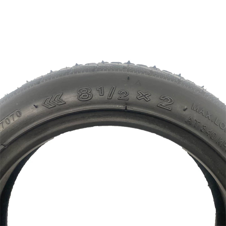 Close up of 8.5x2 size marking on YuanXing scooter tyre sidewall