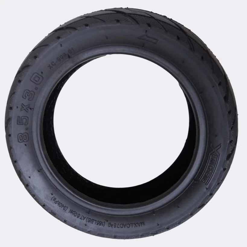 Side profile view of 8.5x3 Xuancheng scooter tyre showing tyre markings and directional fitment arrow
