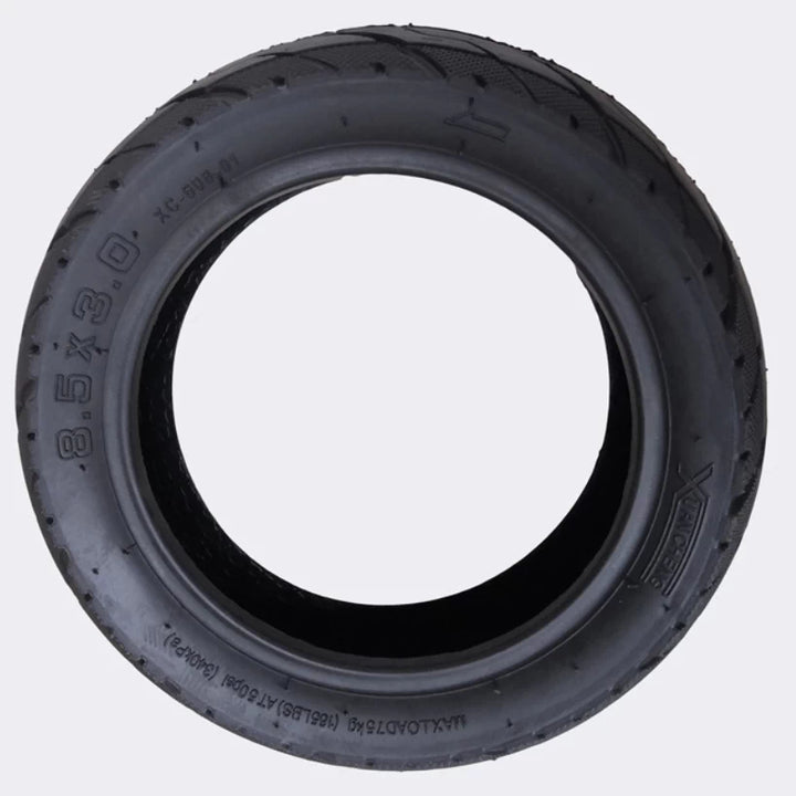 Side profile view of 8.5x3 Xuancheng scooter tyre showing tyre markings and directional fitment arrow
