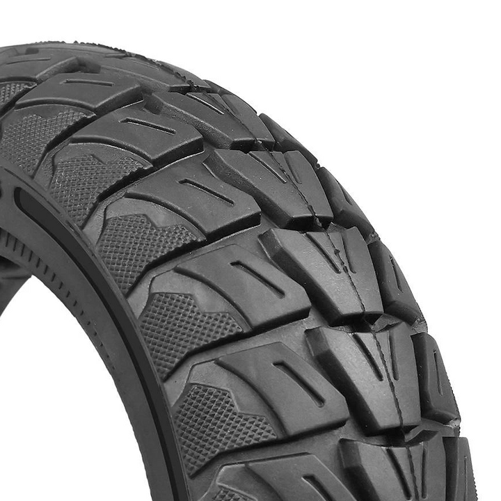 10x3 off road electric scooter tyre aggressive tread pattern close up