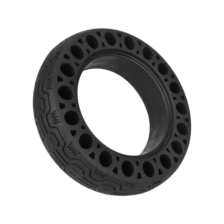 Perspective view of airless scooter tyre showing honeycomb cavities and internal mounting channel