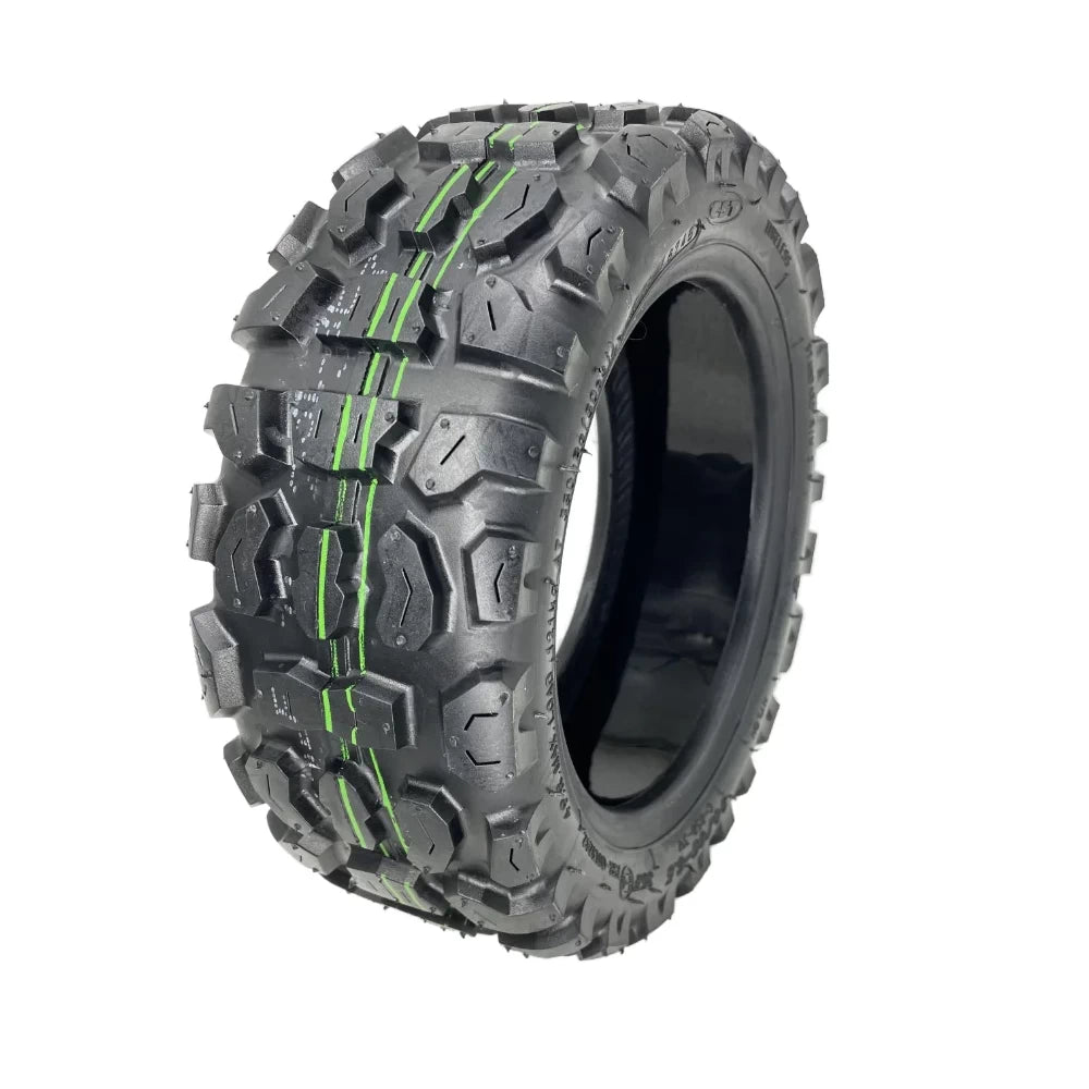 Reverse hero view of the CST 90/65-6.5 off road scooter tyre, showing rugged tread pattern and self-healing layer inside.