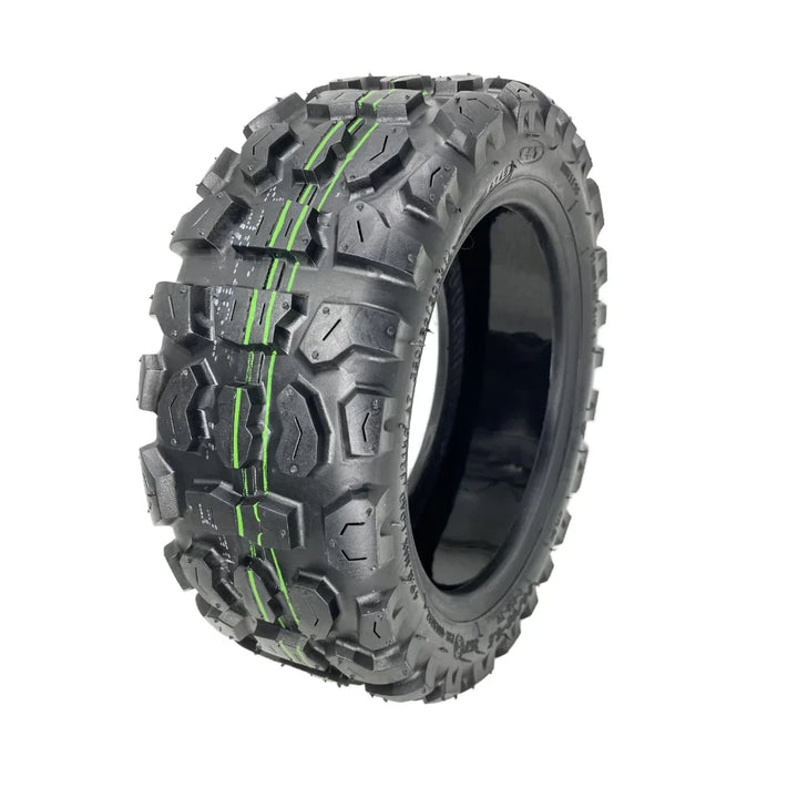 Reverse hero view of the CST 90/65-6.5 off road scooter tyre, showing rugged tread pattern and self-healing layer inside.
