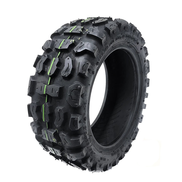 Hero angled view of the CST 90/65-6.5 Off Road Tyre with aggressive tread pattern for off-road terrain.