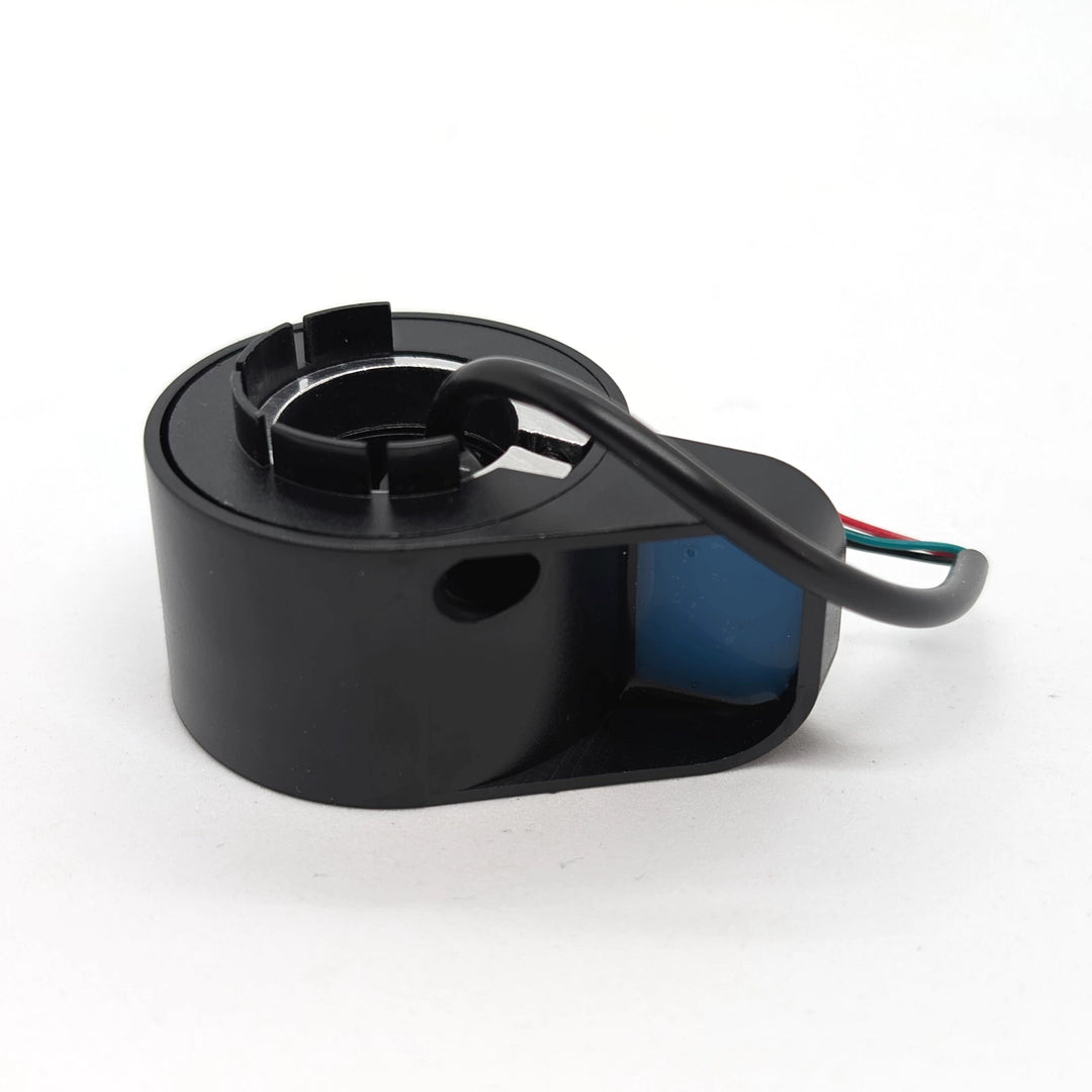 Underside of aftermarket Ninebot ES accelerator thumb throttle with blue grip and mounting housing