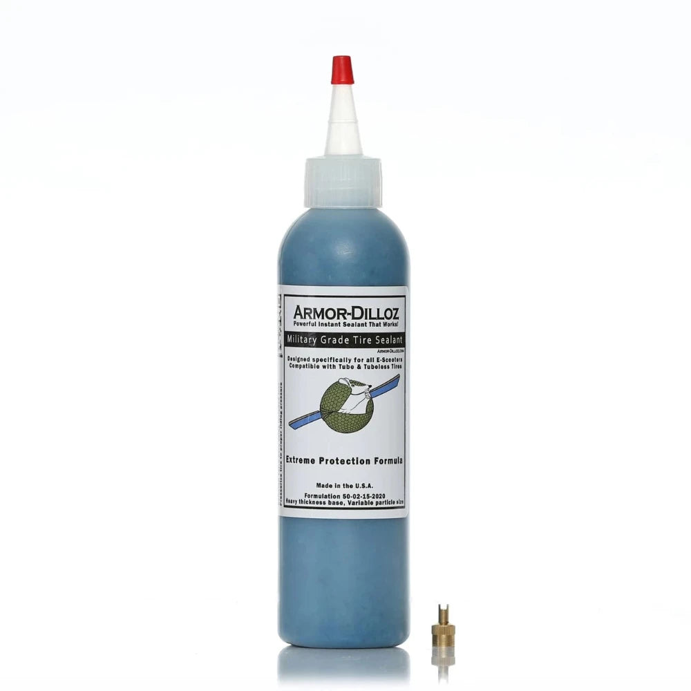 Bottle of blue Armor-Dilloz Military Grade Tire Sealant with included valve removal tool, designed for puncture prevention and enhanced durability in electric scooter and bike tyres.