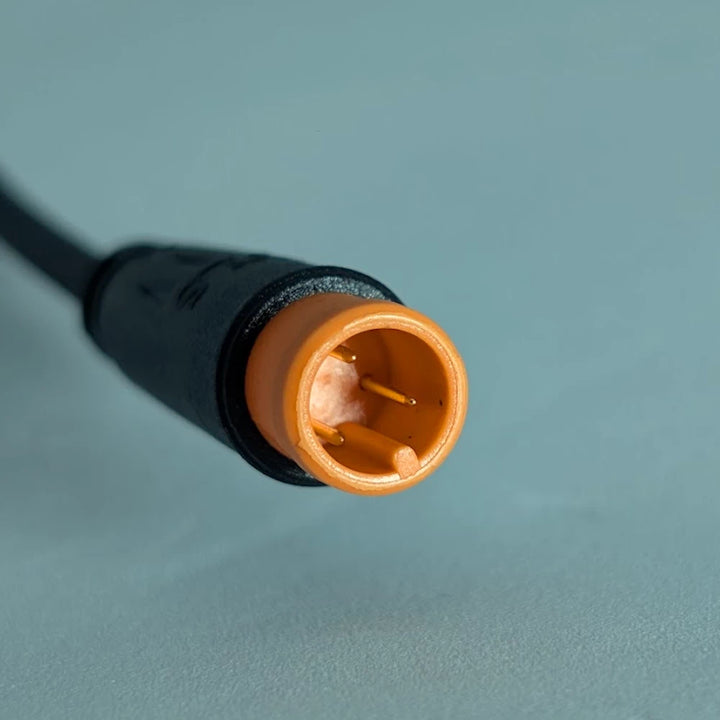 3-pin male Julet connector orange throttle plug close-up