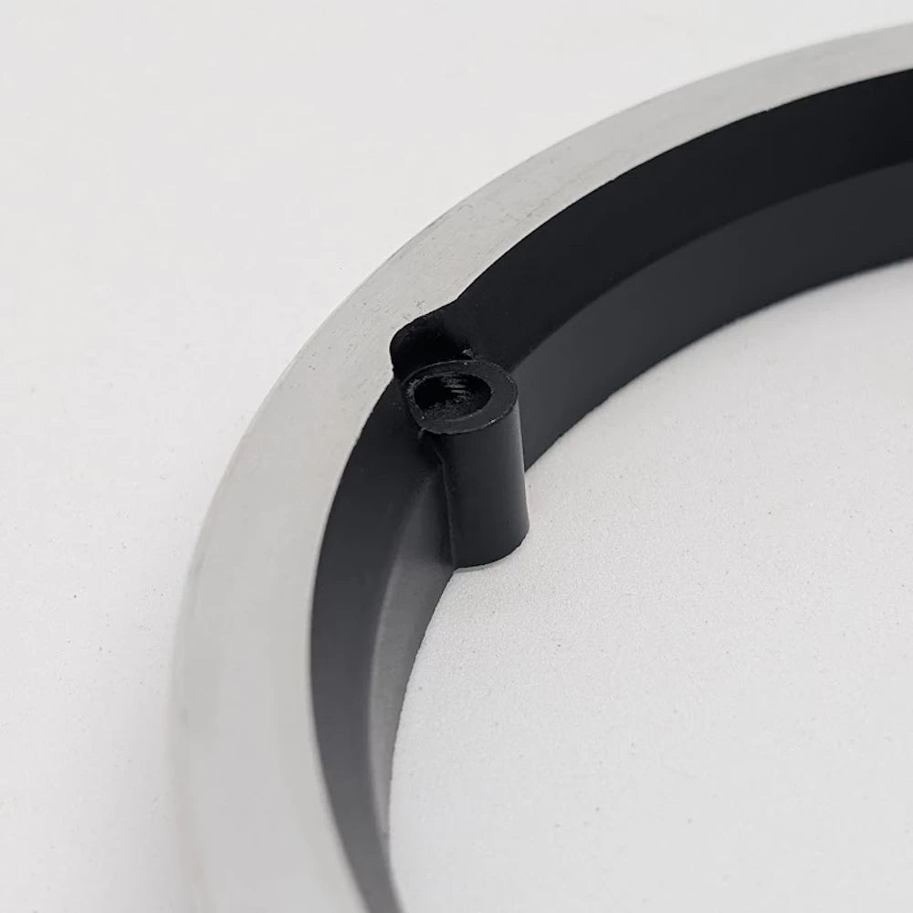 Close-up of bolt hole and mounting point on detachable motor ring