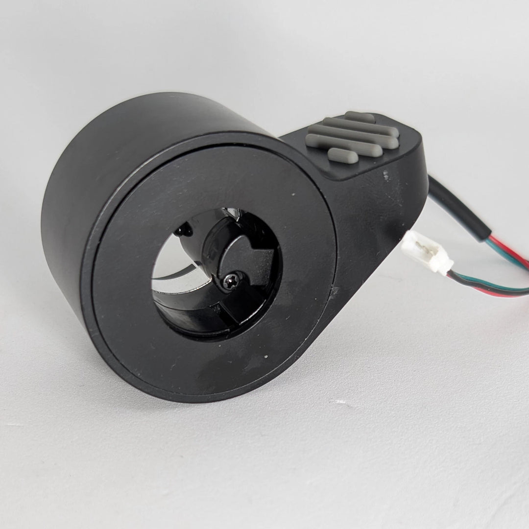 Ninebot ES electronic brake control internal mounting detail with grey thumb grip and wiring
