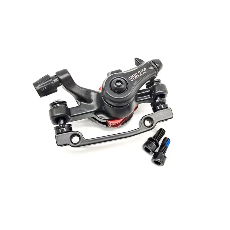 Angled hero view of TOLAN brake caliper with included bolts and mounting hardware