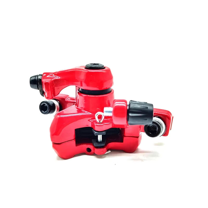 Top-down view showing the arm mechanism, cable entry and adjustment screw and the top of the brake pads, secured with a split pin.