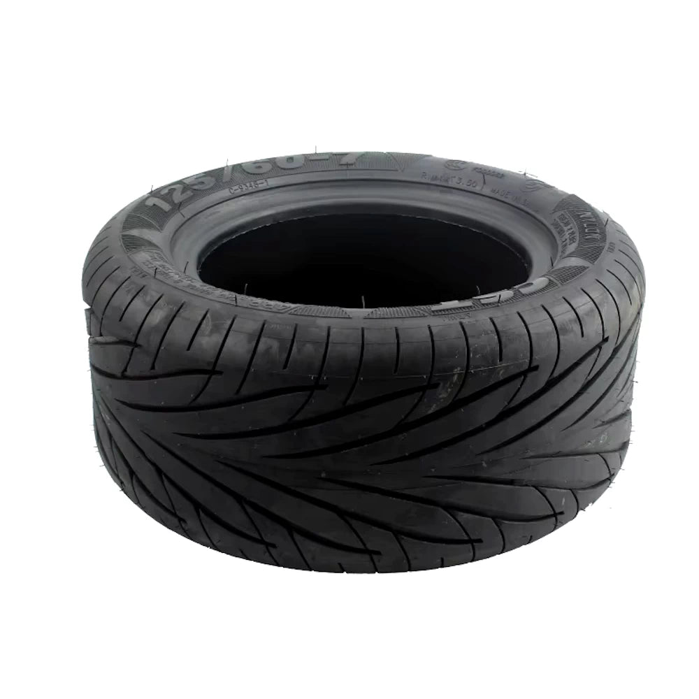 Top view of of genuine 13" CST 125/60-7 tubeless tyre for high-performance electric scooters and electric unicycles
