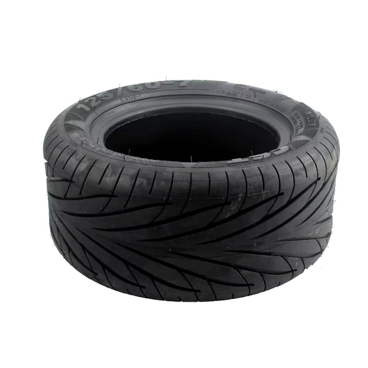 Top view of of genuine 13" CST 125/60-7 tubeless tyre for high-performance electric scooters and electric unicycles