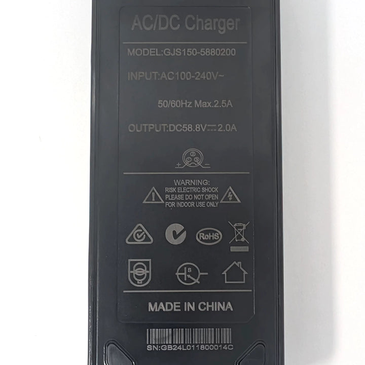 Close-up view of the specification plate on EcoMotion's 58.8V 2A charger with the 3-pin GX16-3 plug for 52V electric scooters, showing the standard wiring configuration of positive at #1 and negative at #3, plus RCM Certification tick.