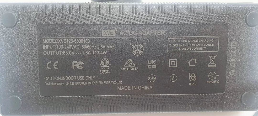 Detailed close-up of specifications panel of XVE126-6300180 Charger (63V 1.8A)/AC Power Adapter for Inmotion 1S