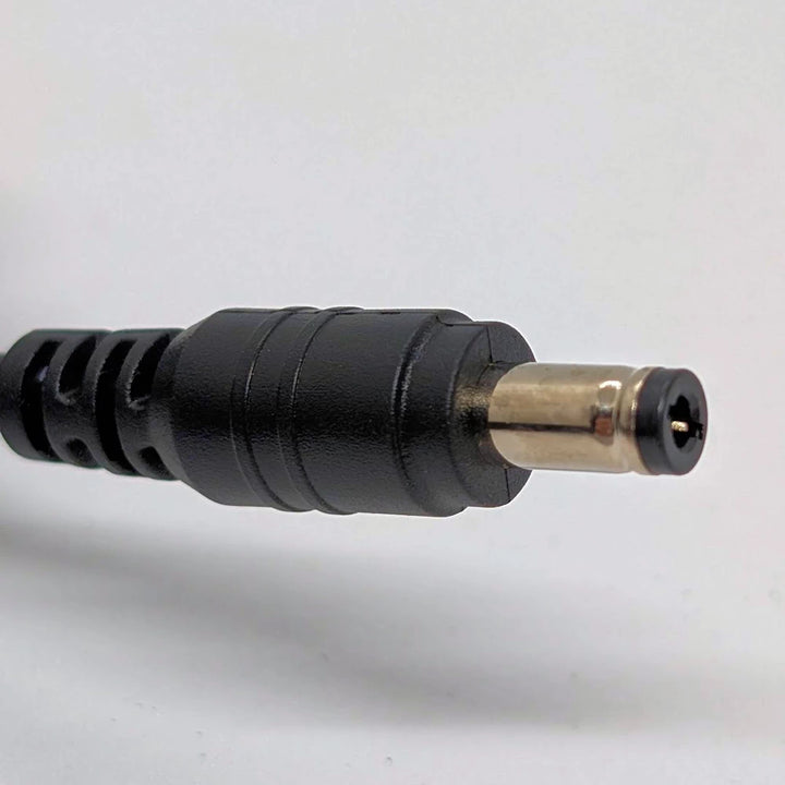 Close-up of DC 2.1 mm male hollow-point plug connector