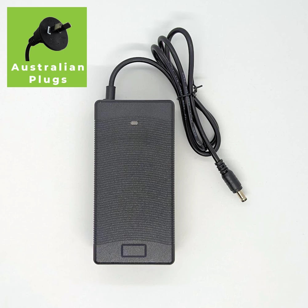 Kugoo charger overhead view with attached DC 2.1 mm plug cable and an overlay indicating Australian Plug is included.