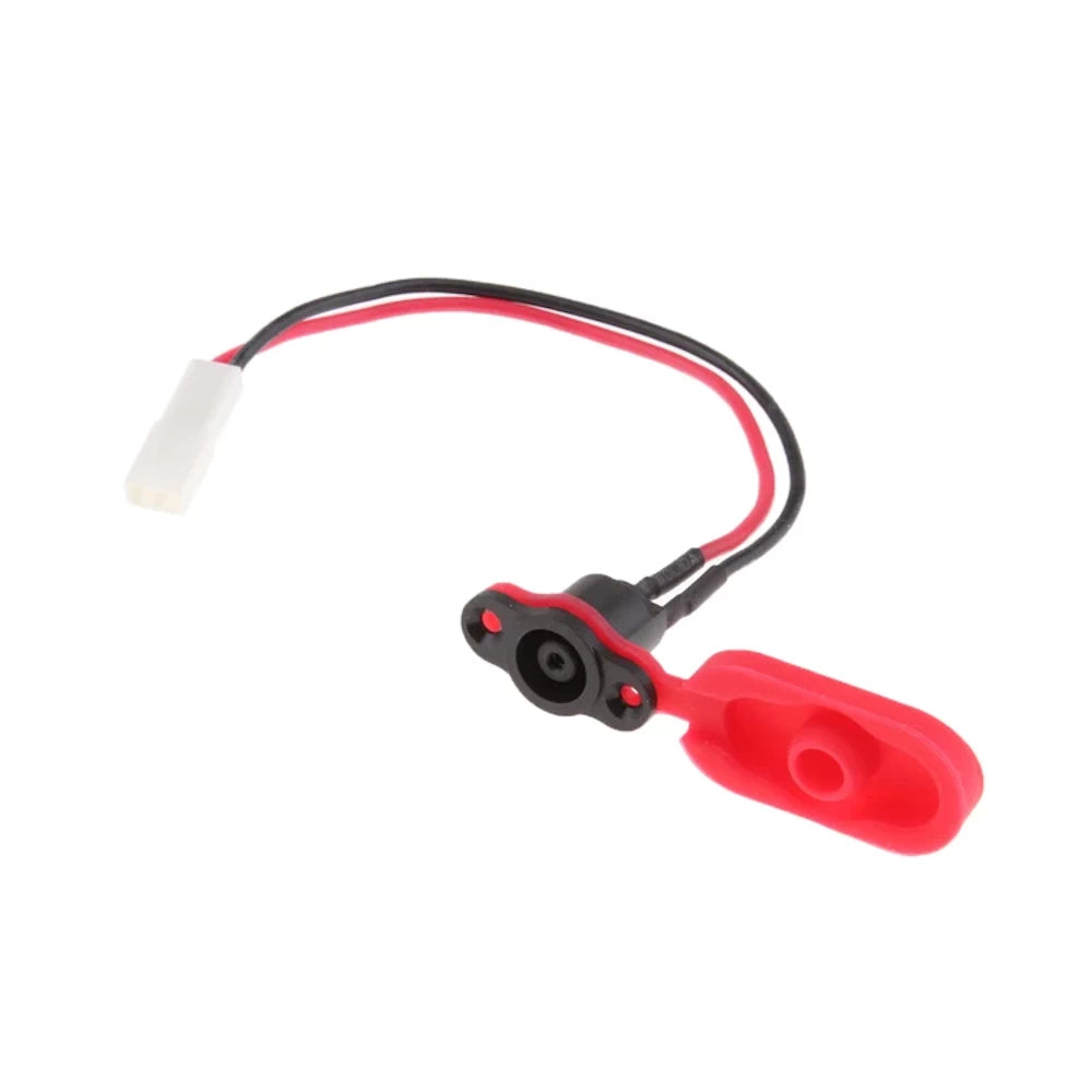 Xiaomi M365 charging port replacement with silicone dust cap fitted.