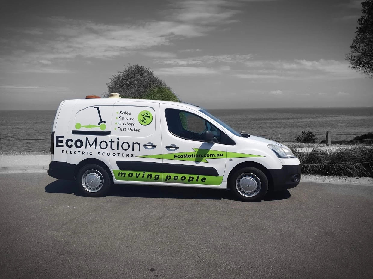 EcoMotion van parked beside Port Phillip Bay at Brighton, Victoria, Australia, offering electric scooter sales, service, and test rides with mobile convenience.