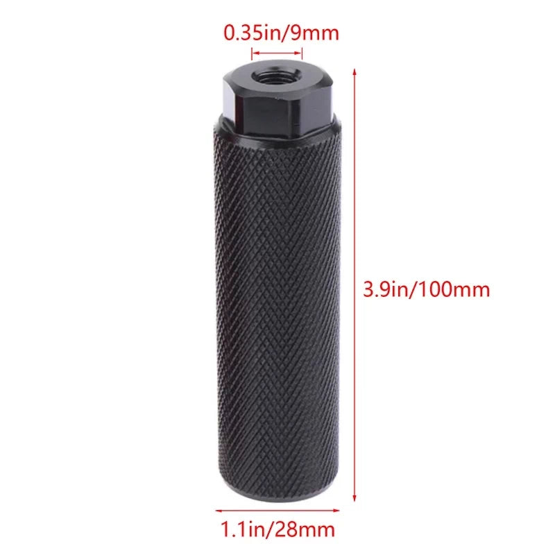 Black alloy foot peg with measurement dimensions shown (100mm length, 28mm diameter, 9mm thread).